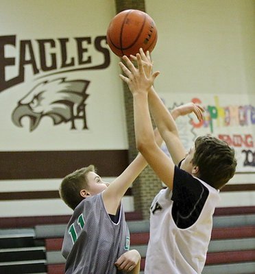Image: Grant Hamby(9) shoots over a Clifton defender.