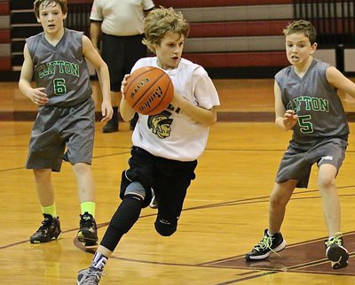 Image: Italy’s Reese Janek(12) curls into the lane to get up a shot against Clifton.