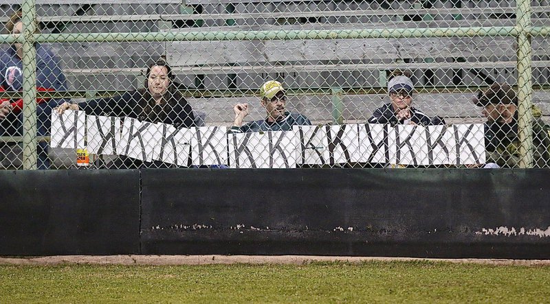 Image: Andi Windham, on the right, tracks her son, Italy Gladiator junior pitcher Ty Windham, and his strikeout count against Faith Family with help from Amanda Connor on the left. Windham totaled 13 strikeouts to lead Italy in their 14-0 shutout win to begin district play.