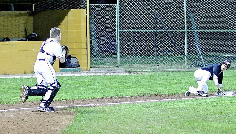 Image: Gotcha! Senior Gladiator catcher John Escamilla(7) catches an Eagle runner in a run down between home and third.