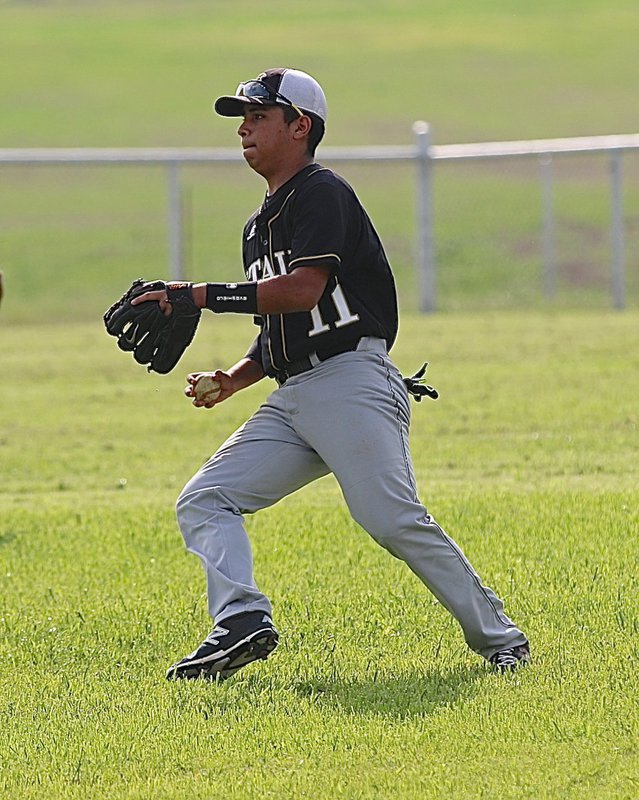 Image: Jorge Galvan(11) takes some reps at second-base before Italy’s game against Frost.
