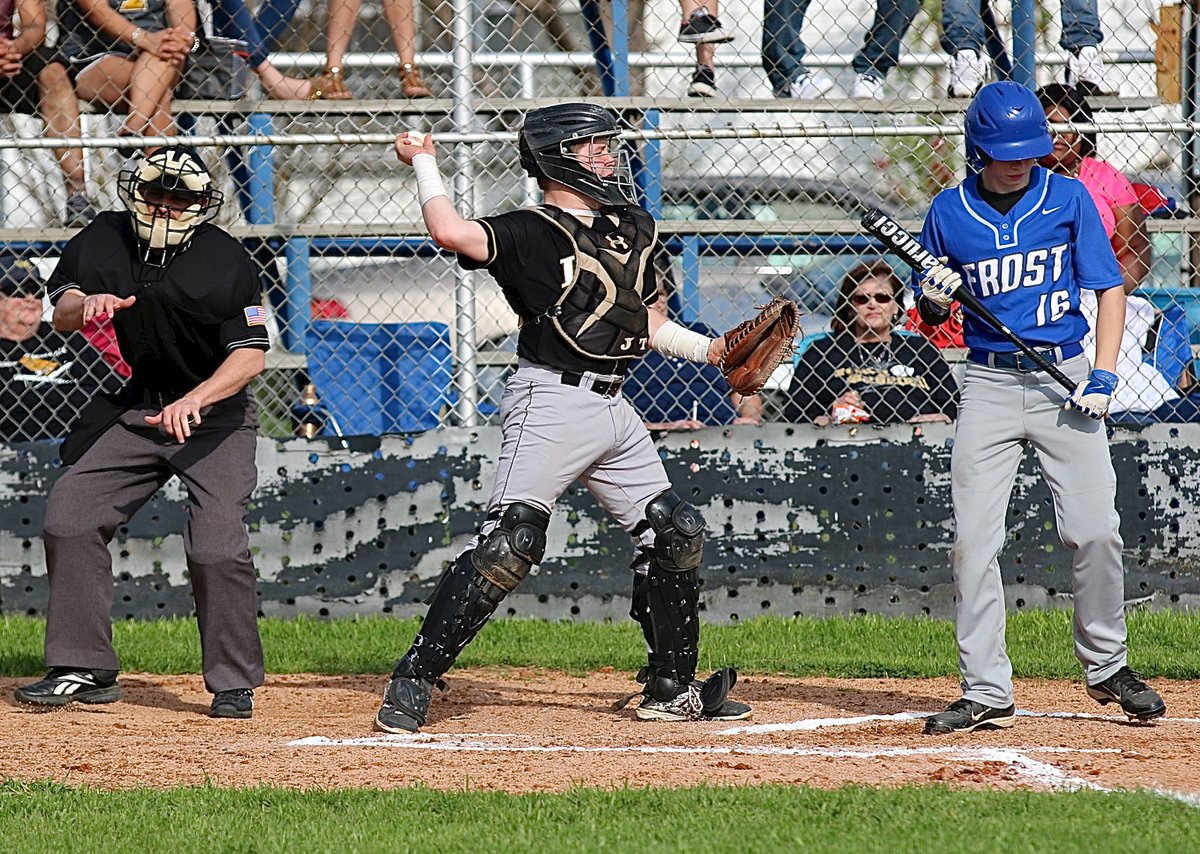 Image: Gladiator catcher John Escamilla(7) pulls in a strike three pitch from his pitcher Ryan Connor.