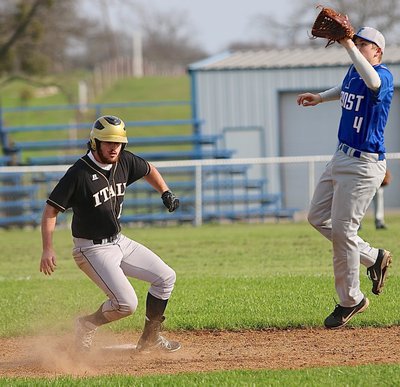 Image: Italy’s Kyle Fortenberry(14) steals second-base with ease.