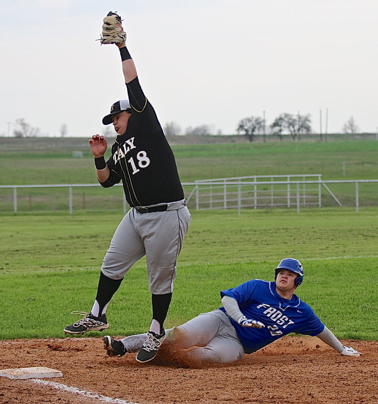 Image: Italy’s John Byers(18) with a great snag to hold the Frost runner at third-base.