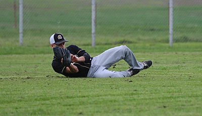Image: Gladiator Levi McBride(1) makes a sliding catch for an out in centerfield. Awesome!