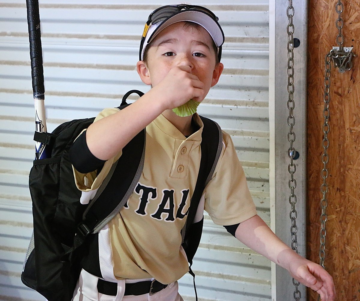 Image: Gared Wood makes off with a win over Maypearl and a cupcake.