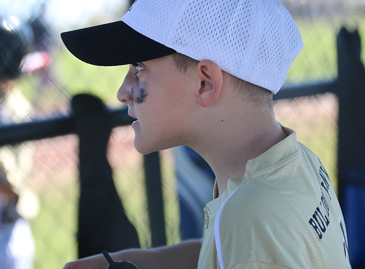 Image: Chance Shaffer cheers on his teammates from the Italy dugout.