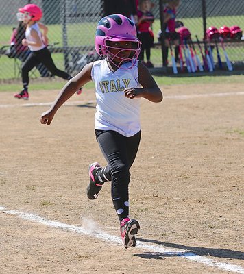 Image: Italy’s T-ball girls run the bases to finish in a tie with Palmer, 15-15.
