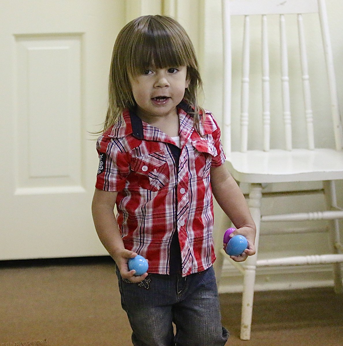 Image: Mason is excited after finding a few more Easter eggs.