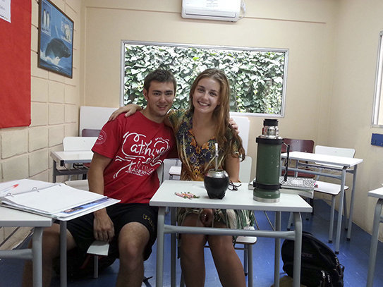 Image: Students enjoying a local tea (matte) in class