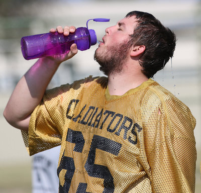 Image: Austin Pittmon(65) provides us with a classic two-a-days watering image.