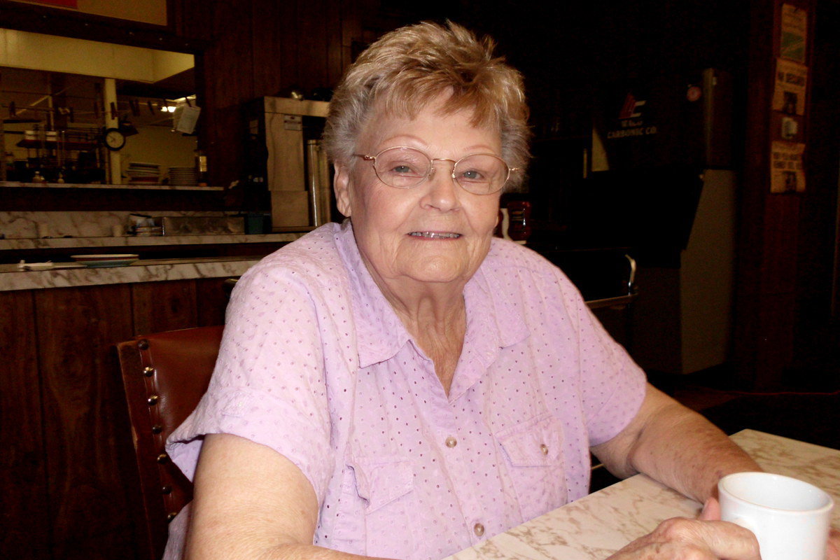 Image: Doris Mitchell enjoys drinking coffee with her regular customers.