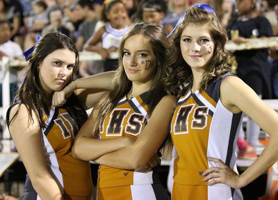Image: Pom-poms with attitude! Our cheerleaders are as tough as our team. Grace Haight, Jozie Perkins and Haylee Turner expect everyone to cheer….and I mean everyone!