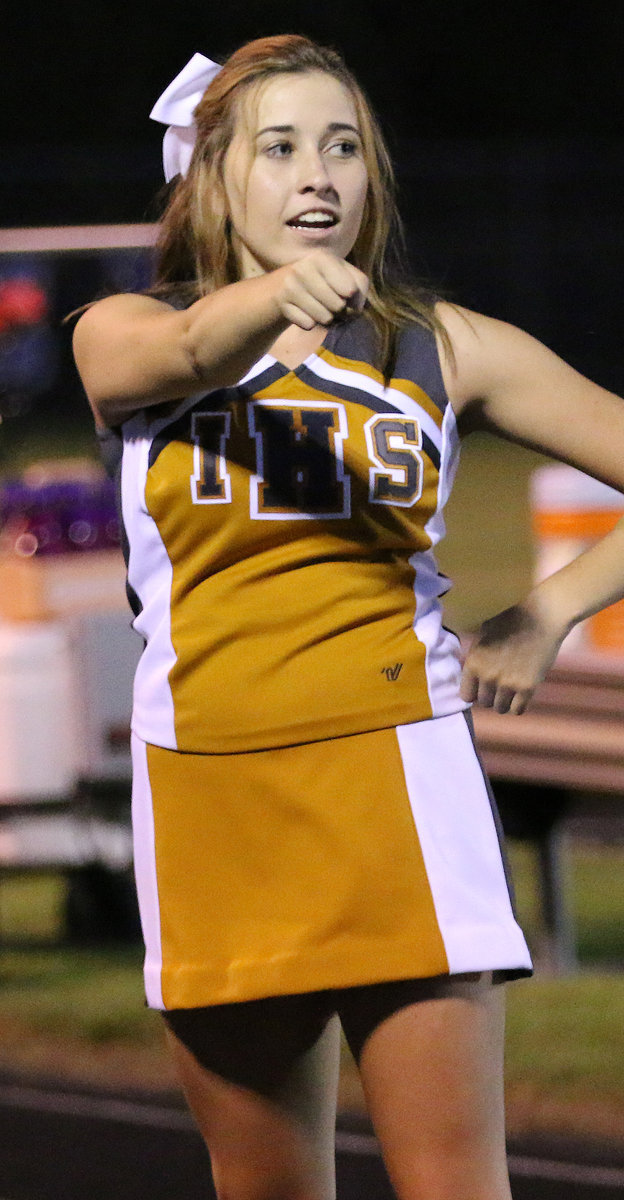 Image: Italy HS Cheerleader Hannah Haight encourages the Gladiators to keep up the fight against Blooming Grove.