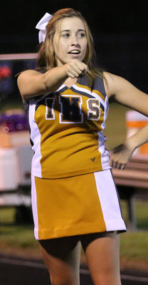 Image: Italy HS Cheerleader Hannah Haight encourages the Gladiators to keep up the fight against Blooming Grove.