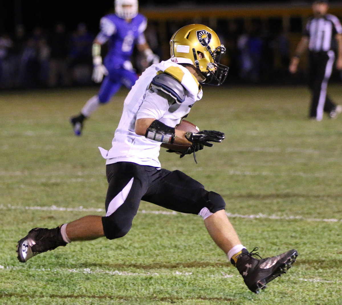 Image: Levi McBride(1) makes the catch and then turns upfield for positive yards against Blooming Grove.