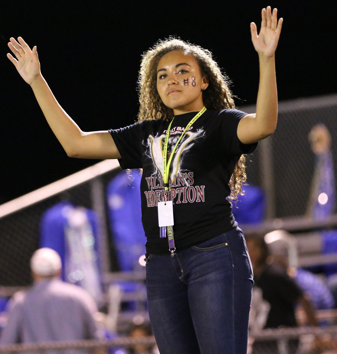 Image: Drum major Vanessa Cantu conducts the Gladiator Regiment Band during halftime.
