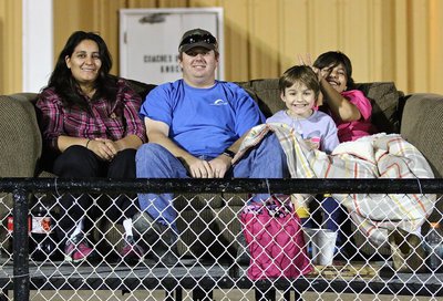 Image: The South Family, Tessa, Mike, Frank and  Evie enjoys some cushy seating during the game.