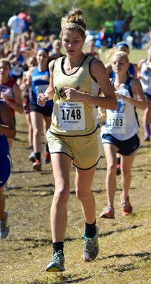 Image: Senior Lady Gladiator Halee Turner, fought back spasms and pain to finish at 15:15 during the two-mile run in Regionals.