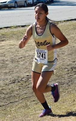 Image: Italy Lady Gladiator Cross-Country team member Marlen Hernandez competes in Regionals.