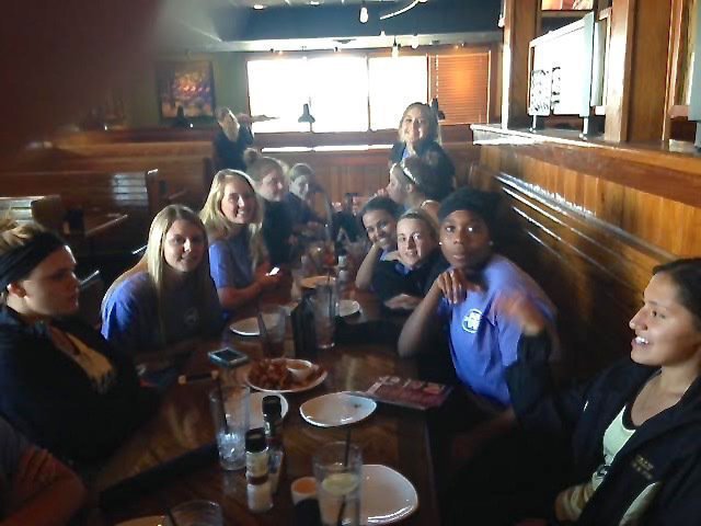 Image: After the meet, the Lady Gladiators celebrate a season well done with a hearty meal!