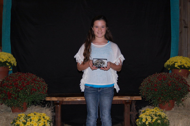 Image: Mikayla Venable wins a buckle for Champion Pony at Halter.