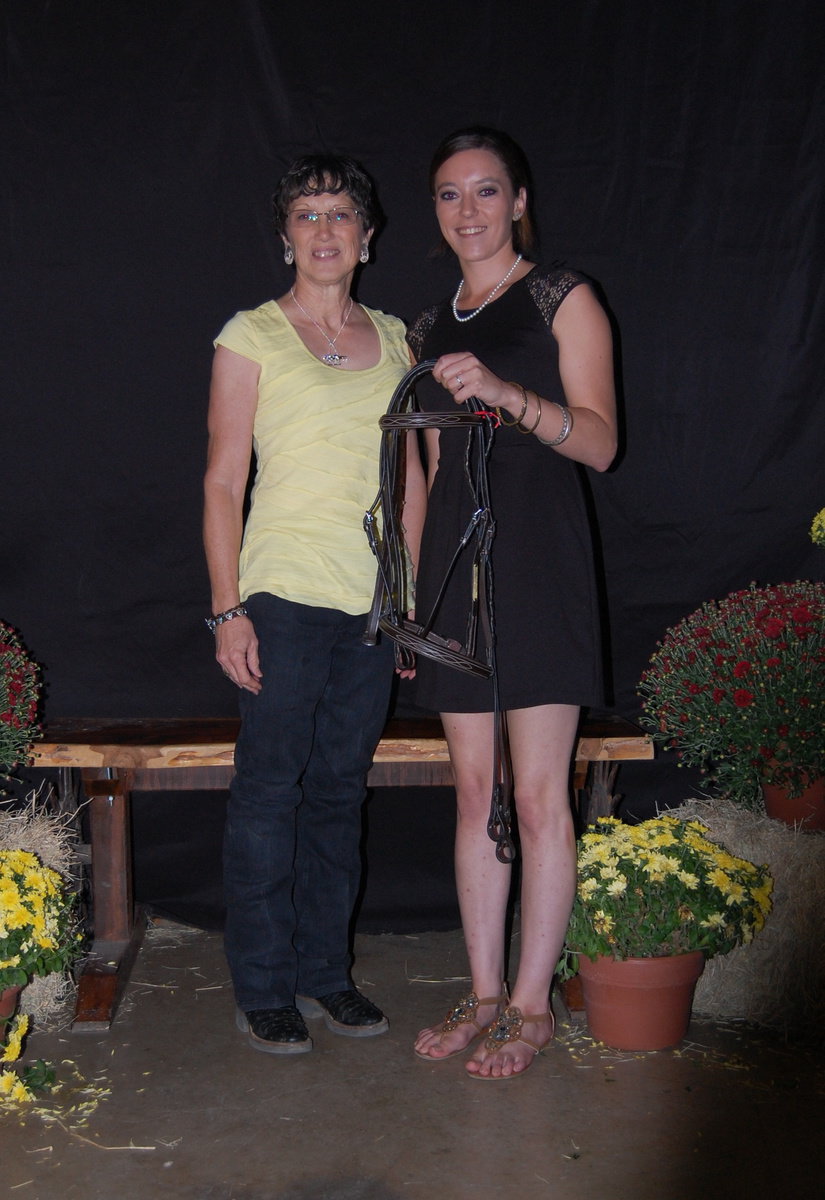 Image: Katelynn Schramm, right, receives her Reserve Champion English prize from sponsor Vivian Kines.