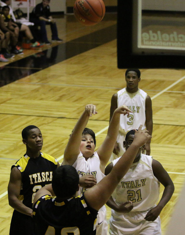 Image: Home crowd favorite Mikey South(5) shoots over Itasca’s defense.