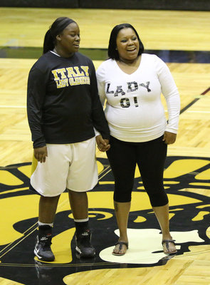 Image: Senior Lady Gladiator Taleyia Wilson is honored during the Senior Night 2K16 pregame celebration while being escorted by her mom, La’Quinqua Wilson