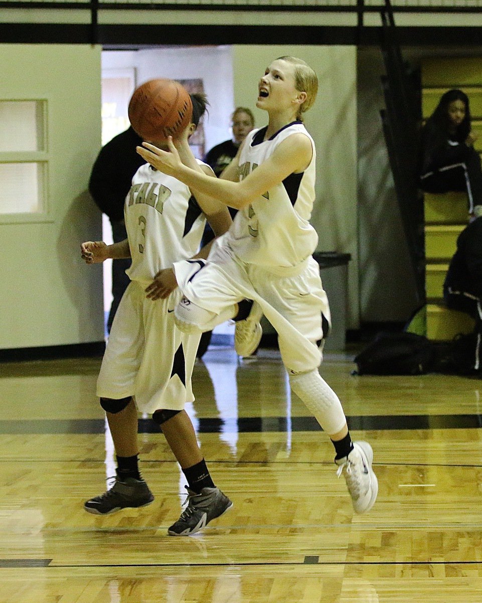 Image: Italy JV Lady Gladiator and rising star Taylor Boyd(5) finishes the fast-break with a layup against Itasca.