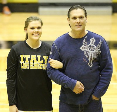 Image: Senior Lady Gladiator Lillie Perry is honored during the Senior Night 2K16 pregame celebration while being escorted by her dad, Paul Perry.
