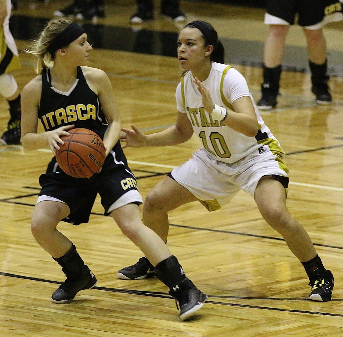 Image: D-Fense! Lady Gladiator April Lusk(10) is a Tenacious defender for Italy as she cuts off a Lady Wampus Cat dribbler.