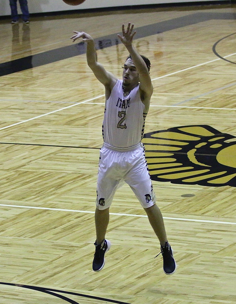 Image: Italy senior Ryan Connor(2) shoots from the outside against Itasca.