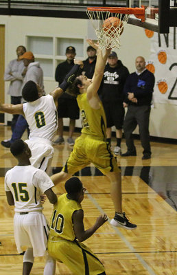 Image: High-flying Ryan Connor(2) gets to the basket against Gateway.