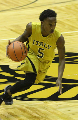 Image: Kevin Johnson(5) goes into attack mode while executing Italy’s half court offense.