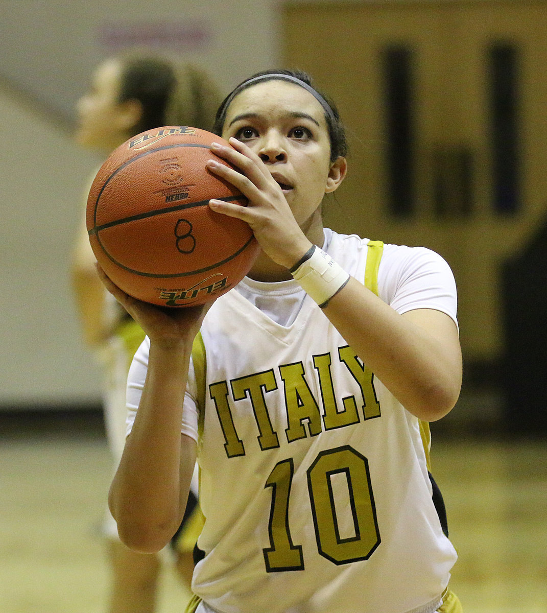 Image: Lady Gladiator April Lusk(10) concentrates while trying her hand at a pair of free-throws.