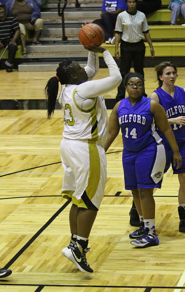 Image: Italy’s Shercorya Chance(33) shoots a quick jumper.