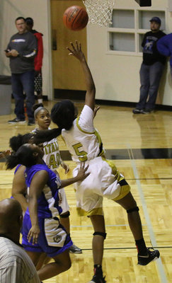 Image: Janae Robertson(5) finished her night with a team-high 19-points for the Lady Gladiators.