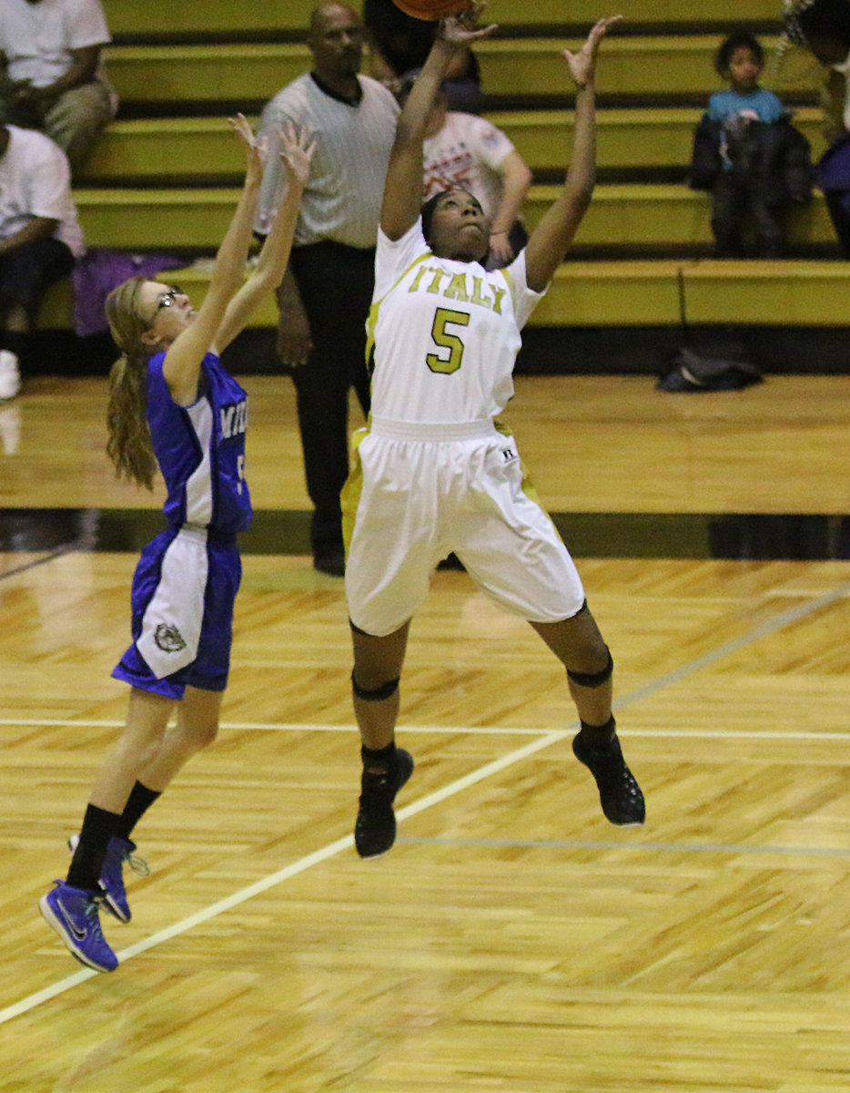 Image: Janae Robertson(5) creates another turnover against Milford. Robertson was relentless defensively for Italy throughout the game.