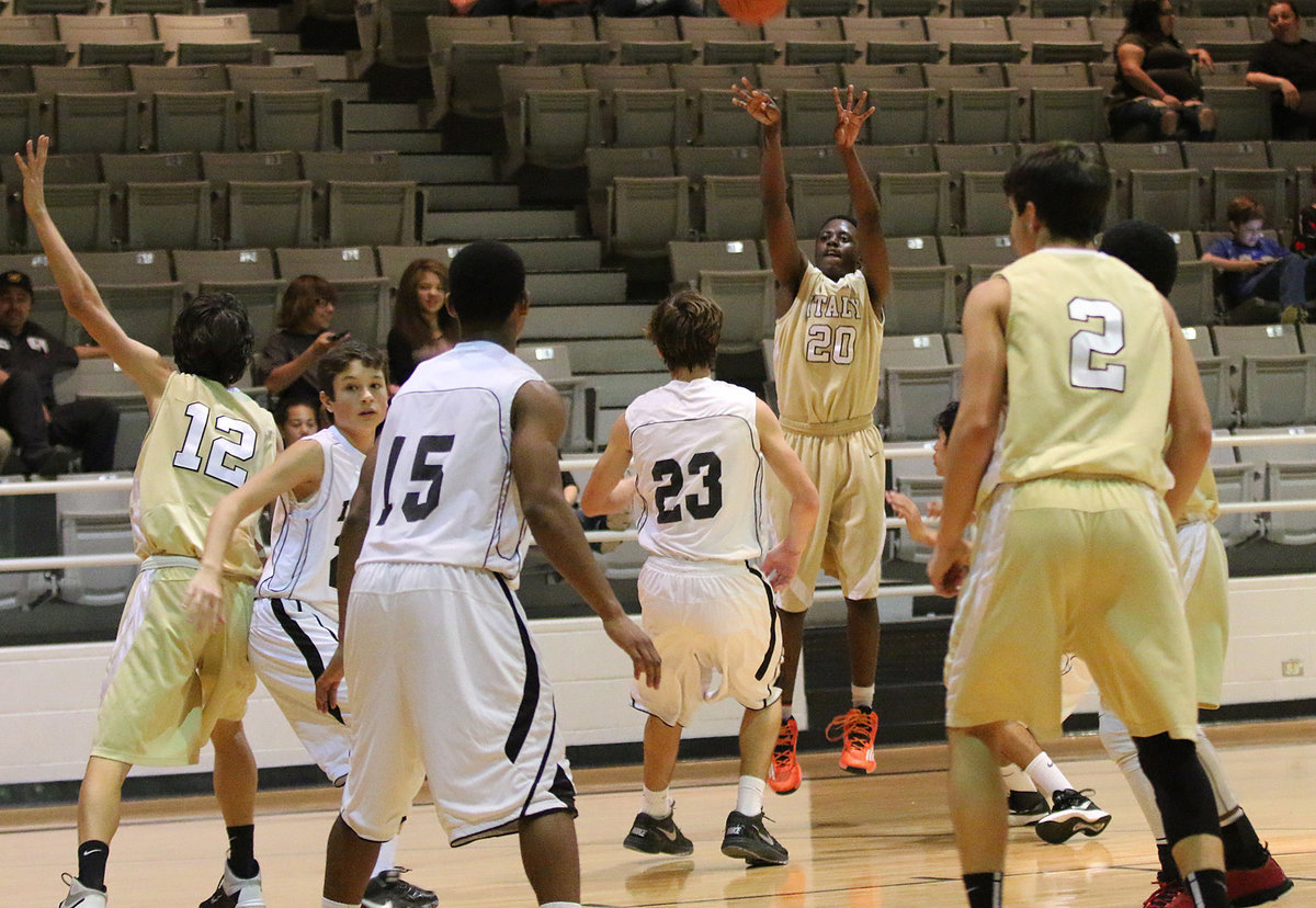 Image: Money! Anthony Lusk(20) sinks one from behind the arc for Italy’s JV Gladiators.