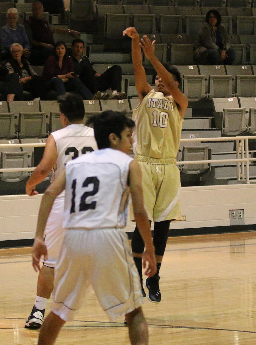 Image: Marcoz Duarte(10) nails this three-pointer to end the third-period at the buzzer, giving Italy a 30-15 lead. Duarte finished with 9-points including a pair of three-pointers.