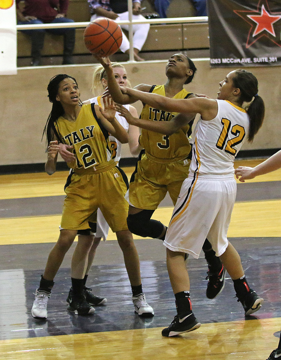 Image: Italy’s Decore Green(3) is fouled on her way to the basket. She knocked down both resulting free-throws. Unfortunately, it was not enough as Era held on for the 65-62 bi-district win.