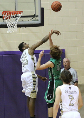 Image: Italy center Christian Lightfoot(25) records a block against Valley View.