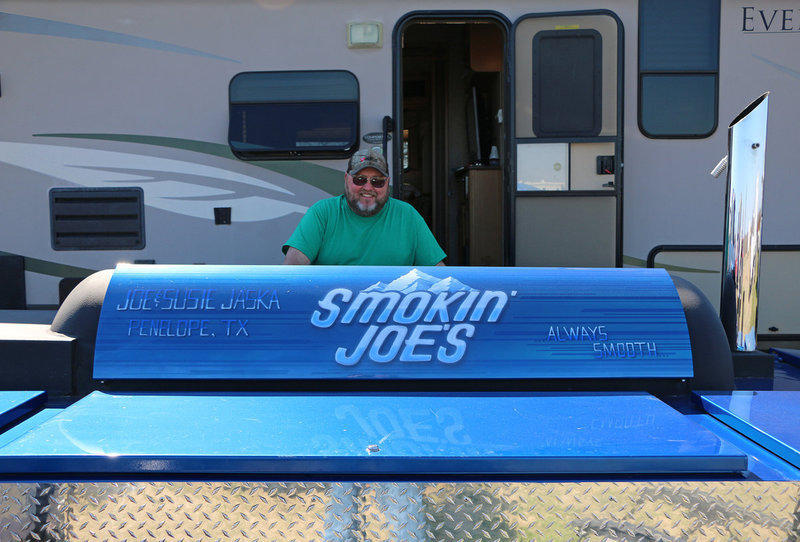 Image: Joe and Susie Jaska of Smokin’ Joe’s taking in the comradery associated with the Lions Club BBQ Cook-off. Smokin’ Joe’s traveled in from Penelope, Texas.