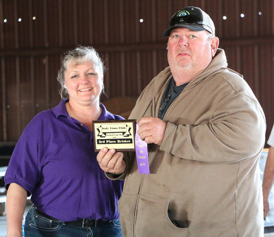 Image: Italy Lions Club member Flossie Gowin presents Robt Erlansor with his 3rd Place plaque and his participation ribbon. 3rd Place paid $84.00.