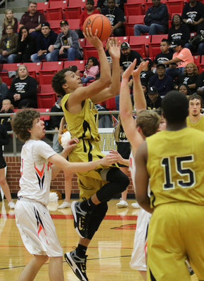 Image: Keith Davis II rises for shot attempt at area with plans to return Italy back to the playoffs next season.
