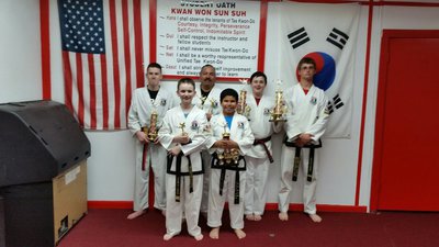 Image: Pictured in these two pictures are: Roger Sam, Nick Sam-Black Belt, Michael Bryant, Jacob Young-Black Belt, Jennifer Procopio and Antonio Procopio; also, one of the instructors Travis Tinney.