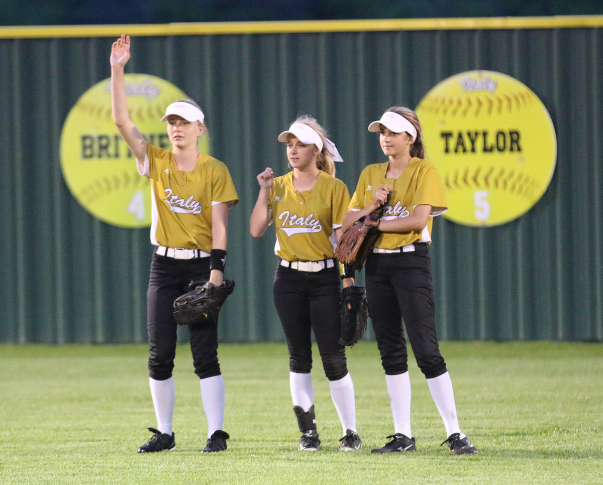 Image: Italy outfielders Taylor Boyd, senior Britney Chambers and Karley Nelson have the infield’s back against Avalon.