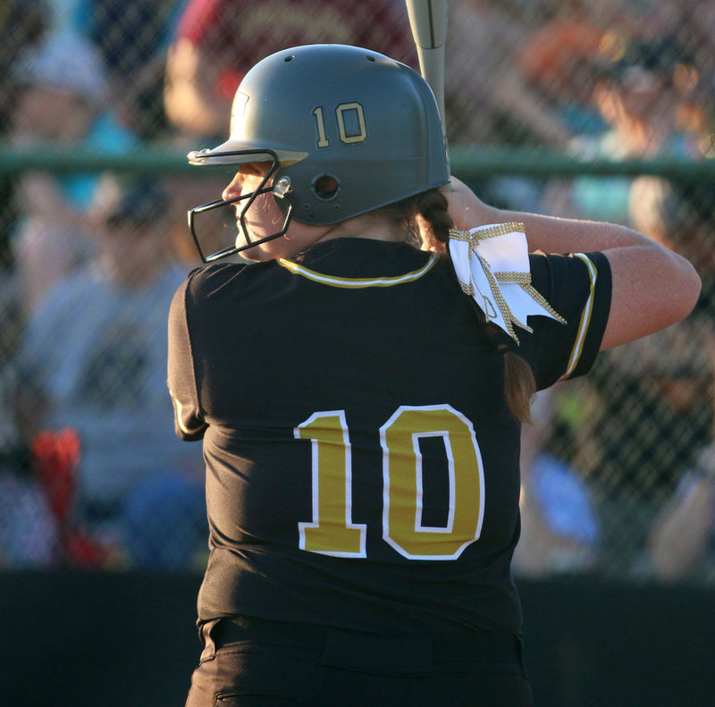 Image: DH Raegan Jones(10) looks for just the right pitch against Covington.