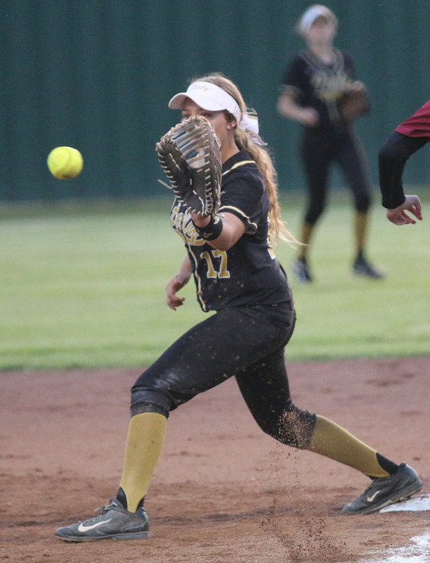 Image: Brycelen Richards(17) does what she does at first-base against Riesel.